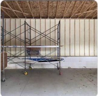 Interior prep and scaffolding before a spray foam day